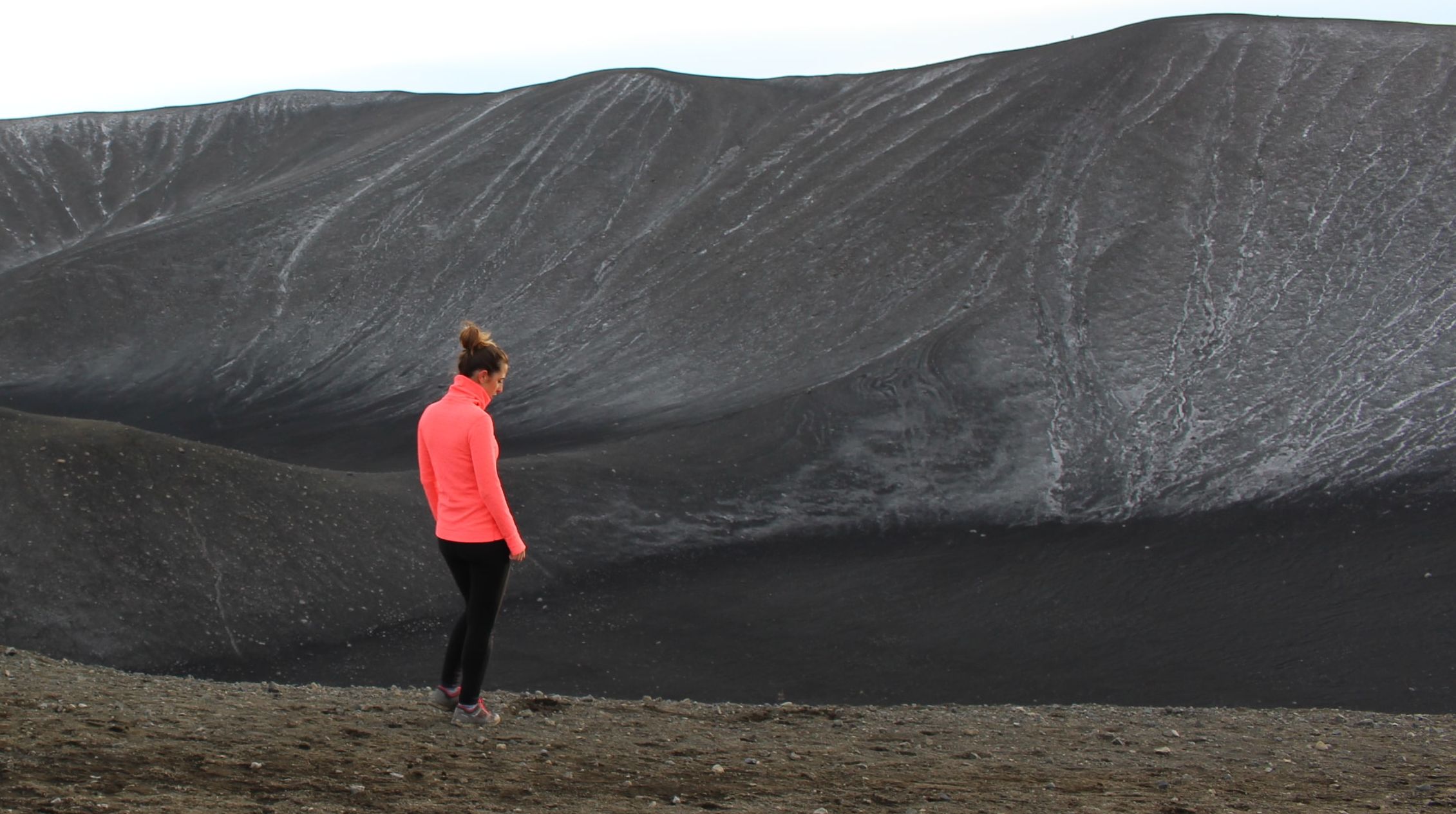 Woman Standing Alone On Volcano